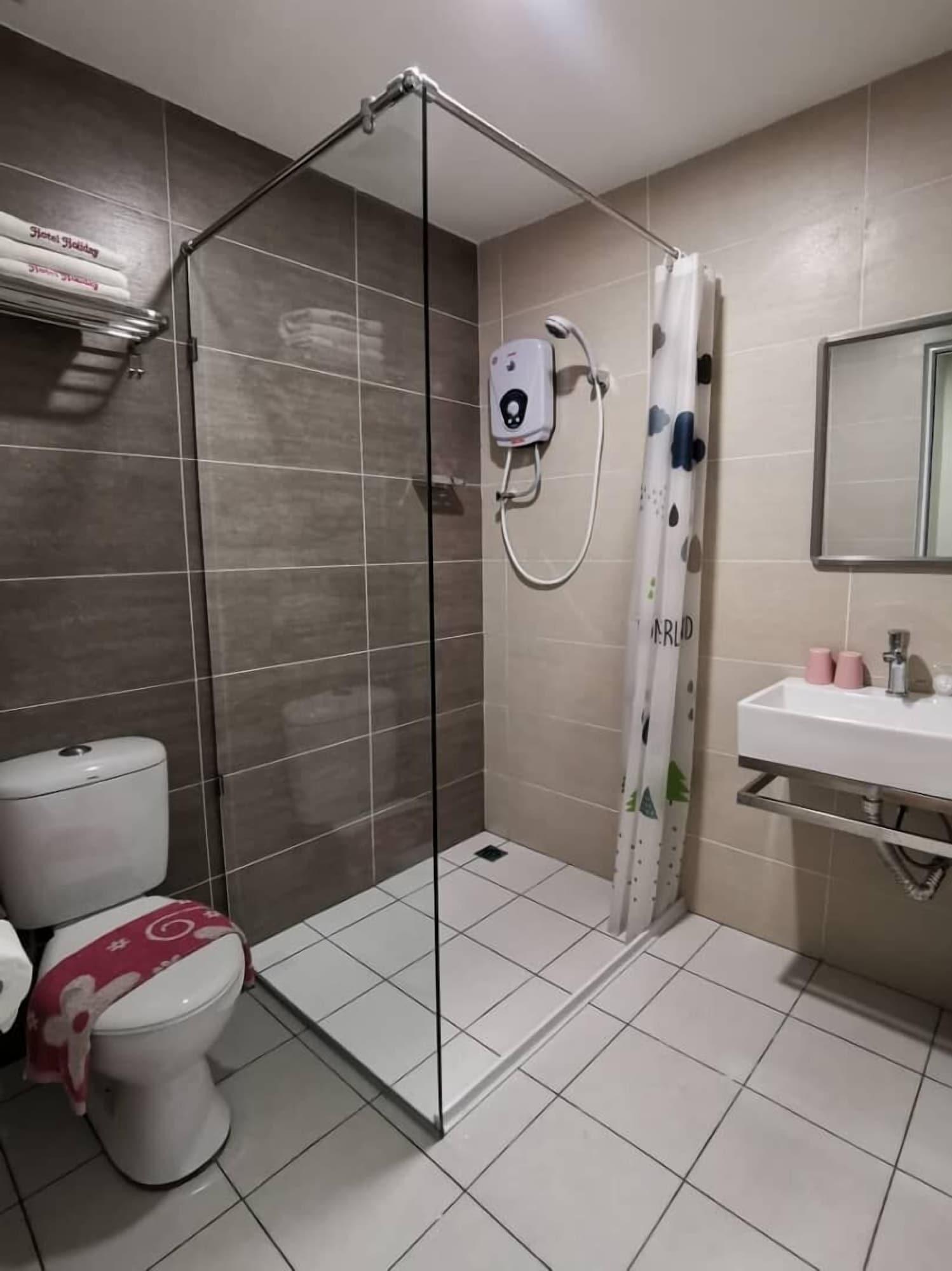 Hotel Holiday Кота Кинабалу Екстериор снимка